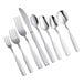 A group of Choice Delmont stainless steel dinner knives with a fork and spoon.