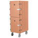 A brown Cambro double compartment tray and sheet pan carrier with two doors.