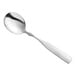 A silver spoon with a long handle.