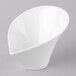 A Schonwald white porcelain bowl with a curved shape and a small hole in the middle.