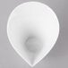 A white Schonwald porcelain bowl with a funnel shape and a circle in the bottom.