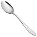 A close-up of a Chef & Sommelier stainless steel spoon with a white handle.