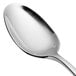 A close-up of a Chef & Sommelier stainless steel teaspoon with a silver handle.