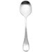 A Chef & Sommelier stainless steel soup spoon with a long handle.