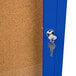 A blue Aarco Bulletin Board cabinet with a key.