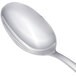 An Arcoroc stainless steel serving spoon with a silver handle.