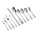 A 12 case of Acopa stainless steel dinner/dessert spoons on a white background.