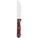 A Chef & Sommelier steak knife with a brown wooden handle.