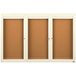 A brown board with a white border and three glass doors.