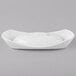 A Schonwald Grace white porcelain dish with a curved edge.