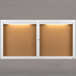 Two white Aarco enclosed bulletin board doors with lights on cork boards.
