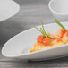 A white Schonwald porcelain tray with food on it.