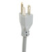 A close-up of a white Hobart power drive unit with two plugs on the cord.