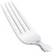 A Libbey stainless steel dinner fork with a silver handle.