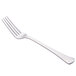 A close-up of a Libbey stainless steel dinner fork with a silver handle.