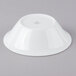 A Schonwald Avanti Gusto white porcelain bowl on a gray surface.