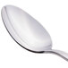 A Libbey stainless steel teaspoon with a silver handle.