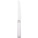 A stainless steel Libbey dinner knife with a fluted blade and a solid white handle.