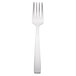 A silver Libbey stainless steel salad fork with a white handle.