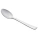 A Libbey stainless steel teaspoon with a white handle.