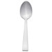 A Libbey stainless steel teaspoon with a white handle.