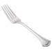 A close-up of a World Tableware Resplendence stainless steel dinner fork with a silver handle.