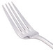A close-up of a World Tableware Resplendence stainless steel dinner fork with a silver handle.
