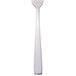 A Libbey stainless steel dinner fork with a white handle.