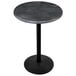 A Holland Bar Stool round black steel laminate outdoor/indoor bar height table with a round black steel base.