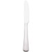 A white rectangular Libbey dinner knife with a silver fluted blade.