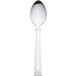 A silver Libbey stainless steel teaspoon with a white handle.