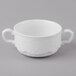 A white porcelain soup cup with two handles.