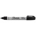 A close-up of a Sharpie Pro Black Bullet Tip Permanent Marker.