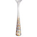 A Master's Gauge stainless steel demitasse spoon with a design on the handle.