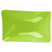 A green and black Brasilia melamine bowl on a white surface.