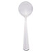 A Libbey stainless steel bouillon spoon with a white handle.