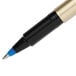 A close-up of a blue Uni-Ball Deluxe pen with a gold tip.