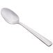 A Libbey stainless steel serving spoon with a silver handle on a white background.