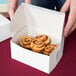 a box of cinnamon rolls