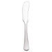 A close-up of a Reserve by Libbey stainless steel butter spreader with a white handle.