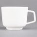 A Villeroy & Boch white porcelain cup with a handle.