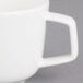 A Villeroy & Boch white porcelain cup with a handle.