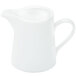 A white pitcher with a handle.