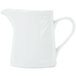 A CAC white porcelain creamer with a handle.