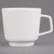 A Villeroy & Boch white porcelain cup with a handle.