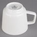 A Villeroy & Boch white porcelain cup with a handle.