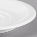 A white Villeroy & Boch porcelain saucer with a circular rim.