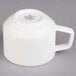 A white Villeroy & Boch porcelain cup with a handle.