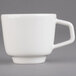 A Villeroy & Boch white porcelain cup with a handle.