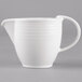 A white Villeroy & Boch porcelain creamer with a handle.